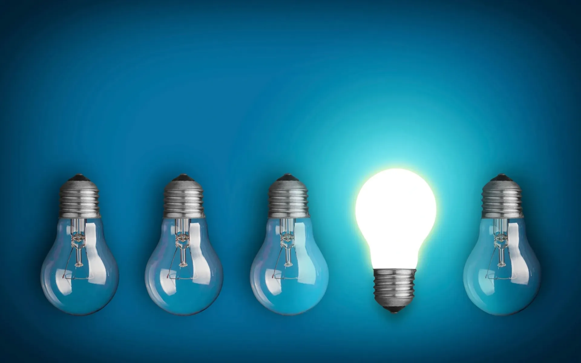A photo of some lightbulbs on a blue background.